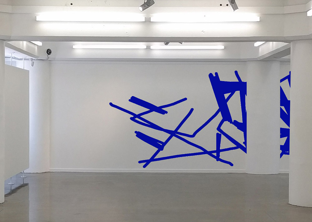 Blue wall work split across to walls - mock up